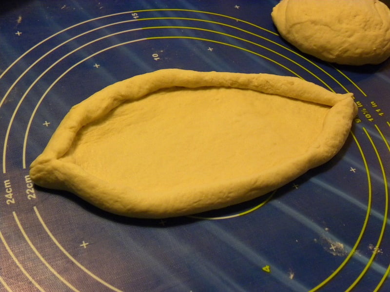 Shaping the dough into a gondola image