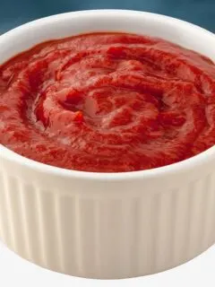 Greek tomato sauce in a white bowl image
