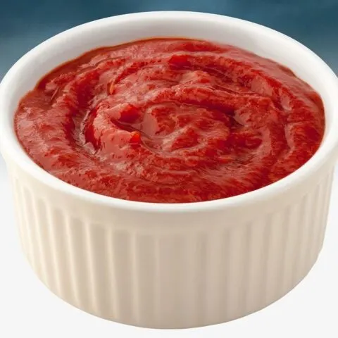 Greek tomato sauce in a white bowl image