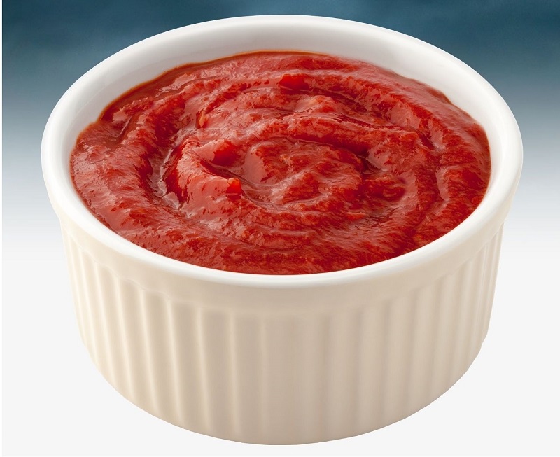 Greek tomato sauce in a white bowl image
