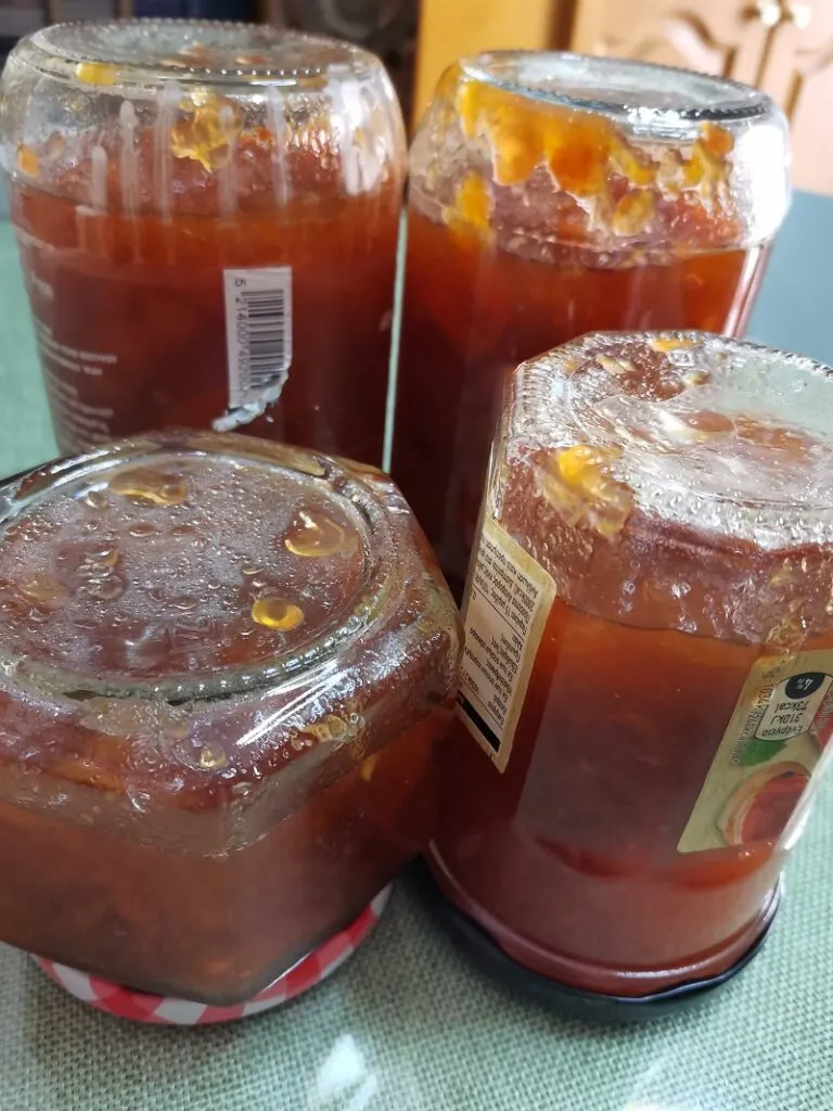 Upside jars of loquat jam image