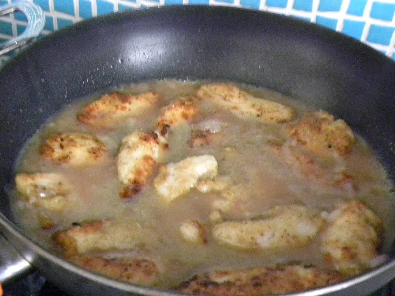 Putting chicken back in the frying pan image