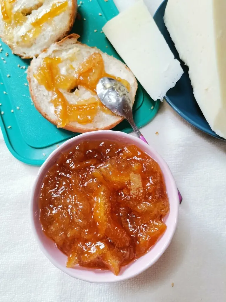 Bergamot marmalade on a bagel and graviera cheese image