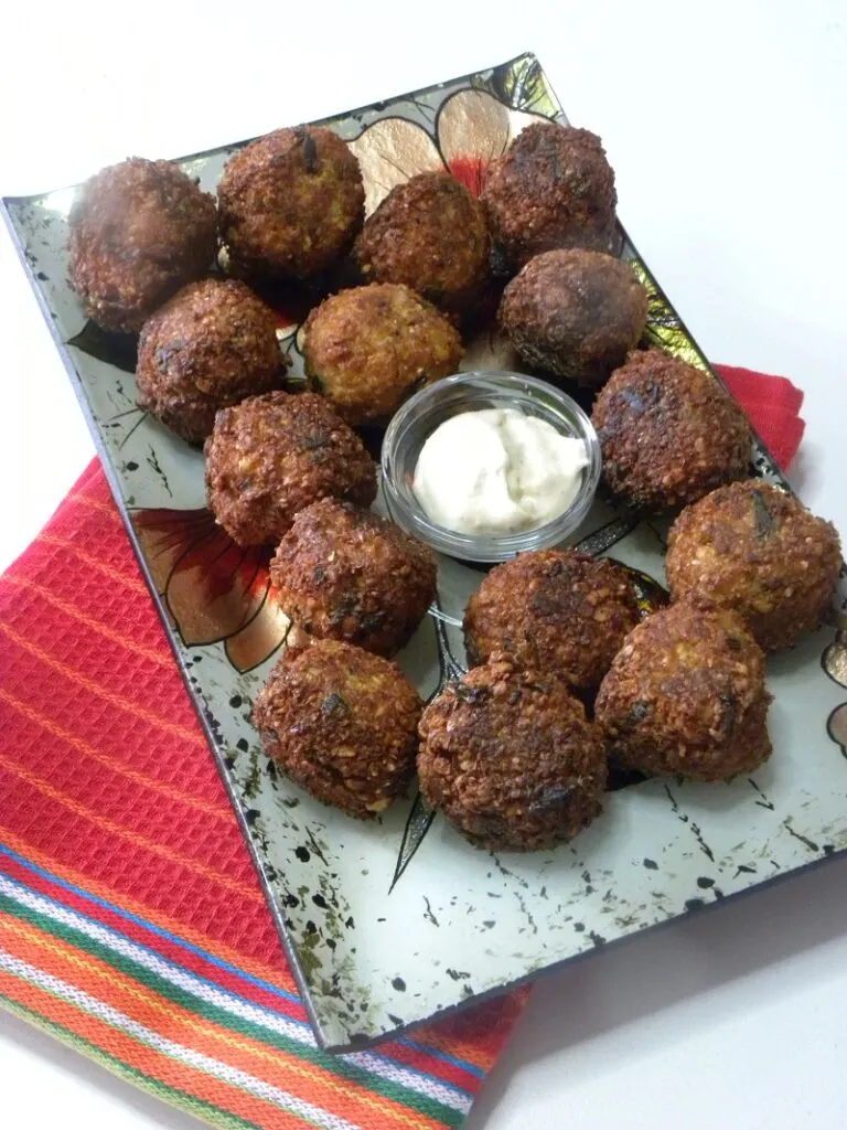Falafel in a plate on a red napkin image