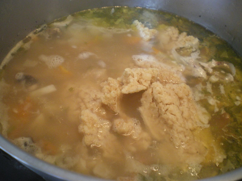 Adding trahanas to soup image