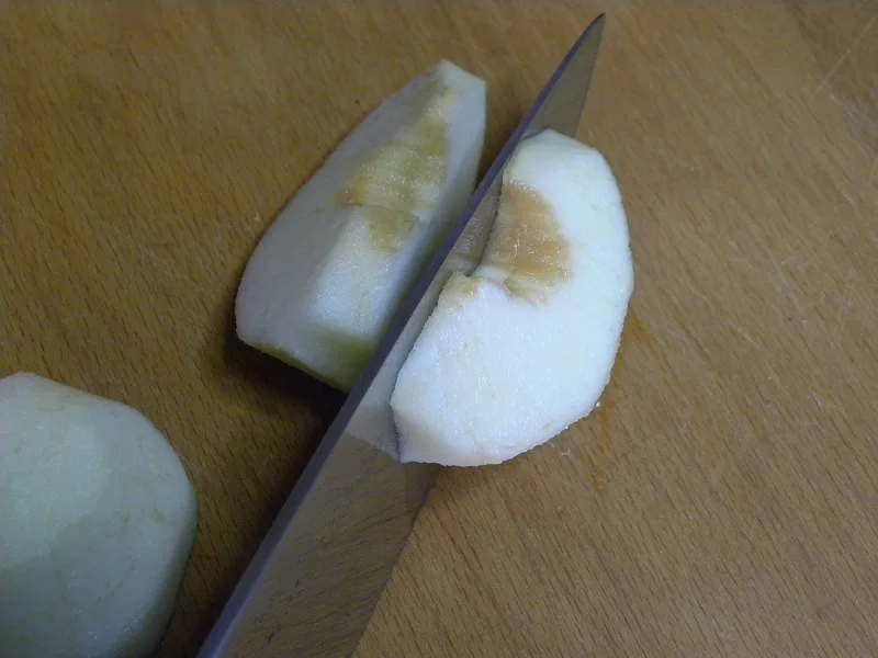 Cutting the apple into slices image