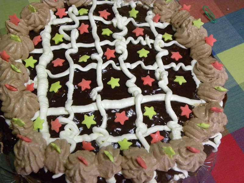 Decorating the cake with candied stars image