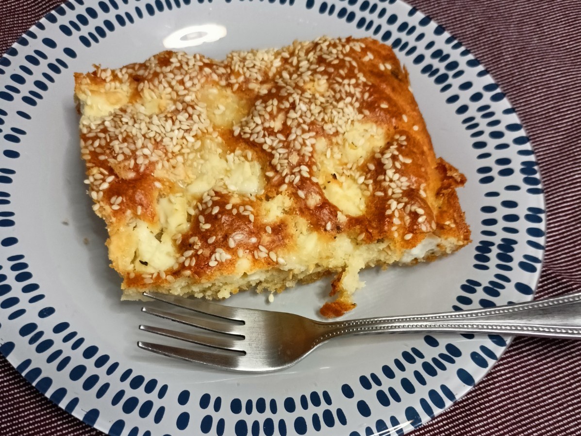 A piece of Feta Cake image