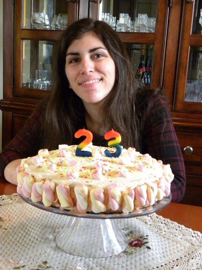 Elia with her birthday marshmallows cake image