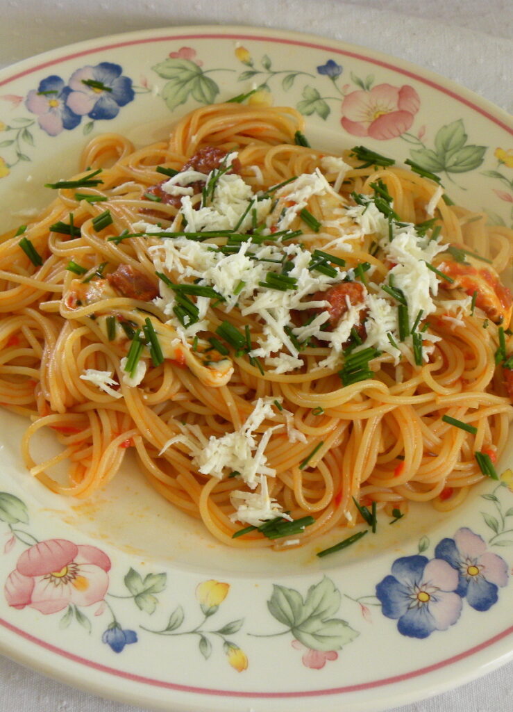 spaghetti with buffalo cheese and sausages picture