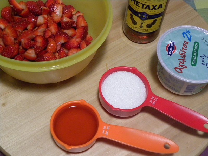 Ingredients to make brandy infused macerated strawberries image