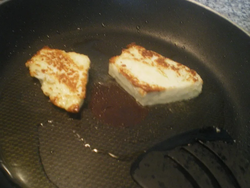 Making saganaki with paneer image