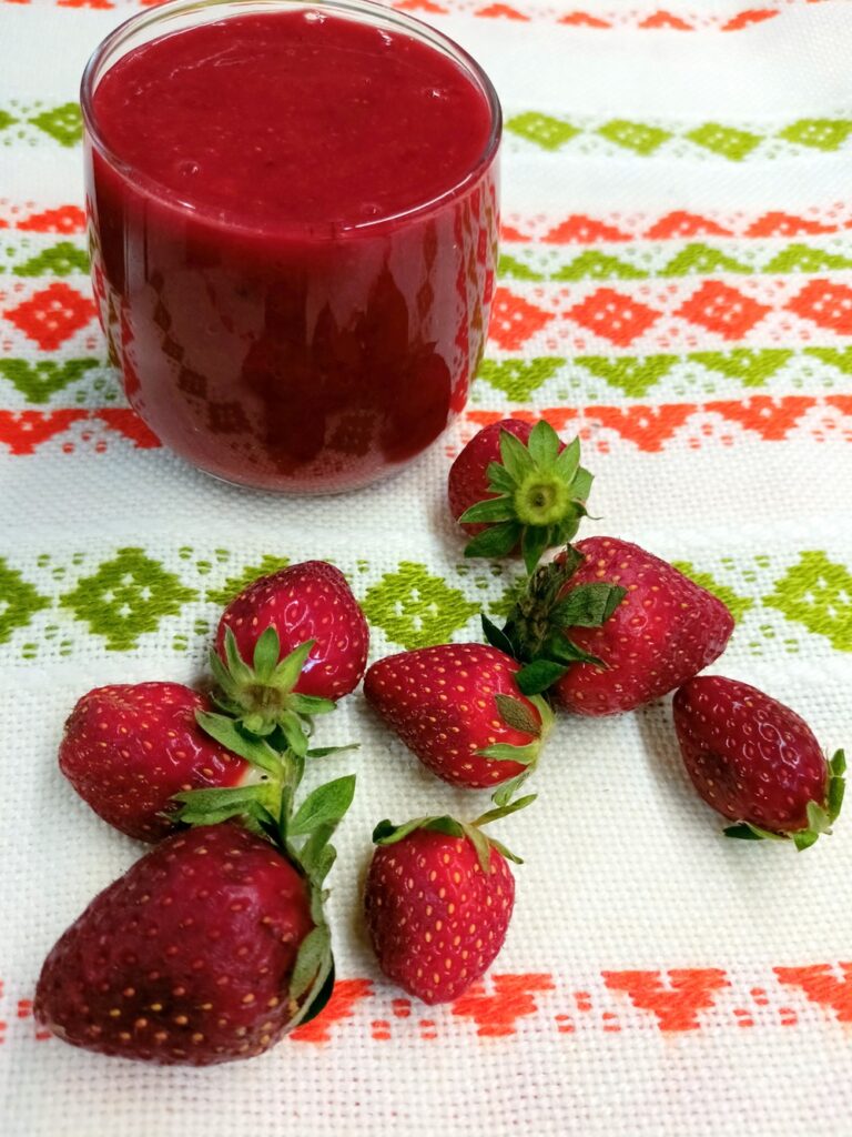Strawberry coulis with fresh strawberries image