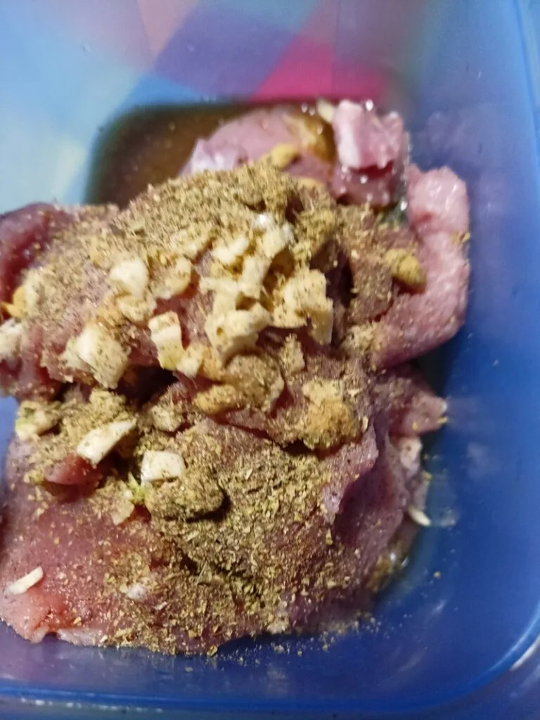 Marinating the pork tenderloin image