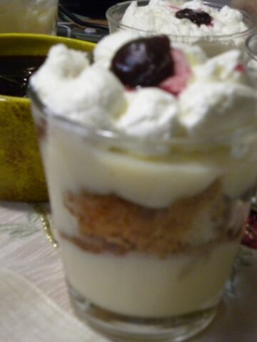 trifle in a glass showing the layers image.