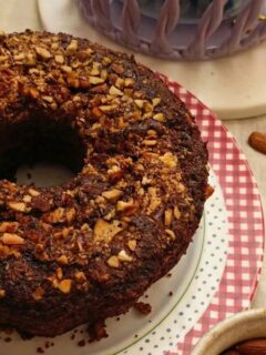 Coconut cake with cocoa and almonds image