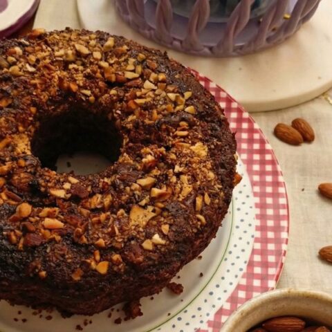 Coconut cake with cocoa and almonds image