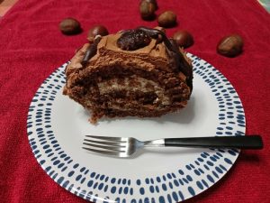 Chestnut and Chocolate Roulade cut and served image