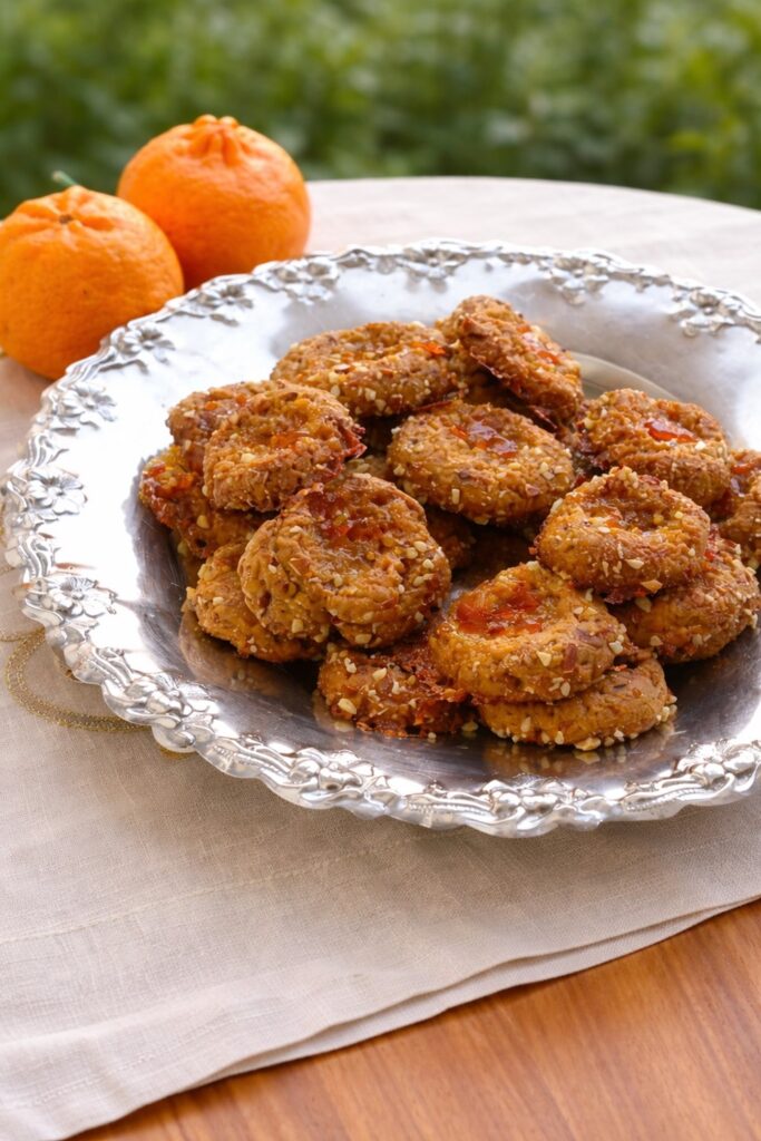 Vegan mandarin thumbprint cookies in a bowl image