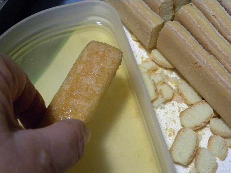 Wetting the savoyard with liqueur image